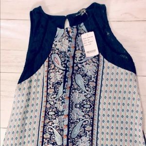 Dress up or dress down Tank top.